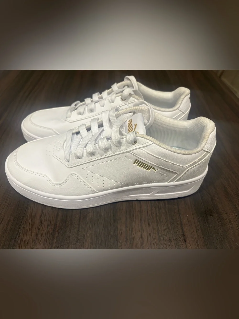 Puma White Low-Top Sneakers with Gold Logo